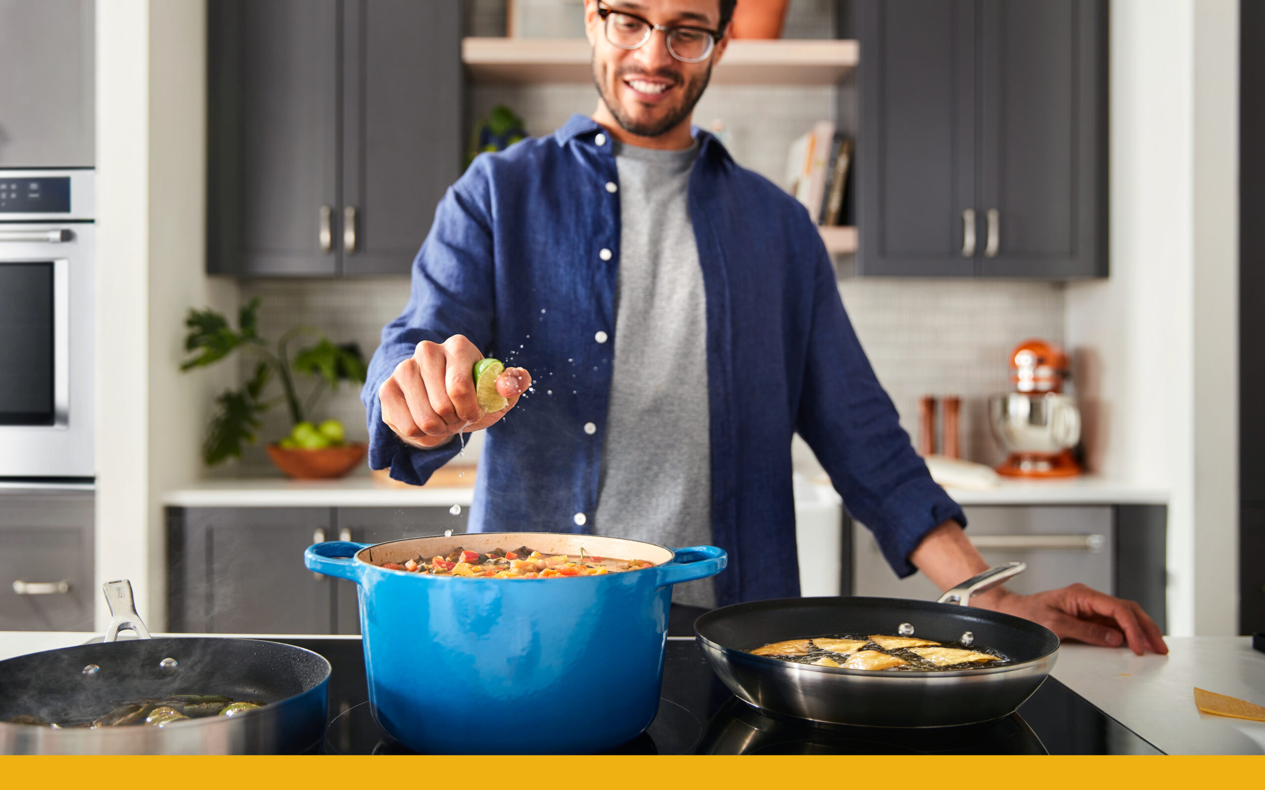 Photo of person cooking on an induction cooktop
