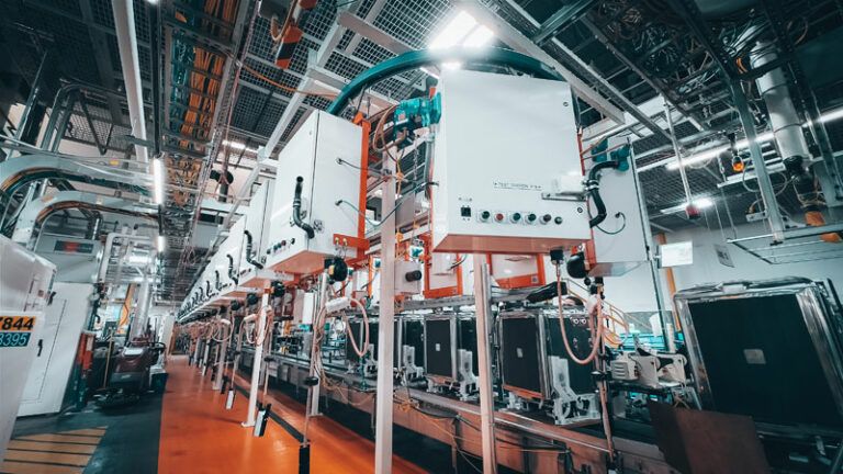 Findlay Operations dishwashers in production, suspended in the air at a Whirlpool Manufacturing site