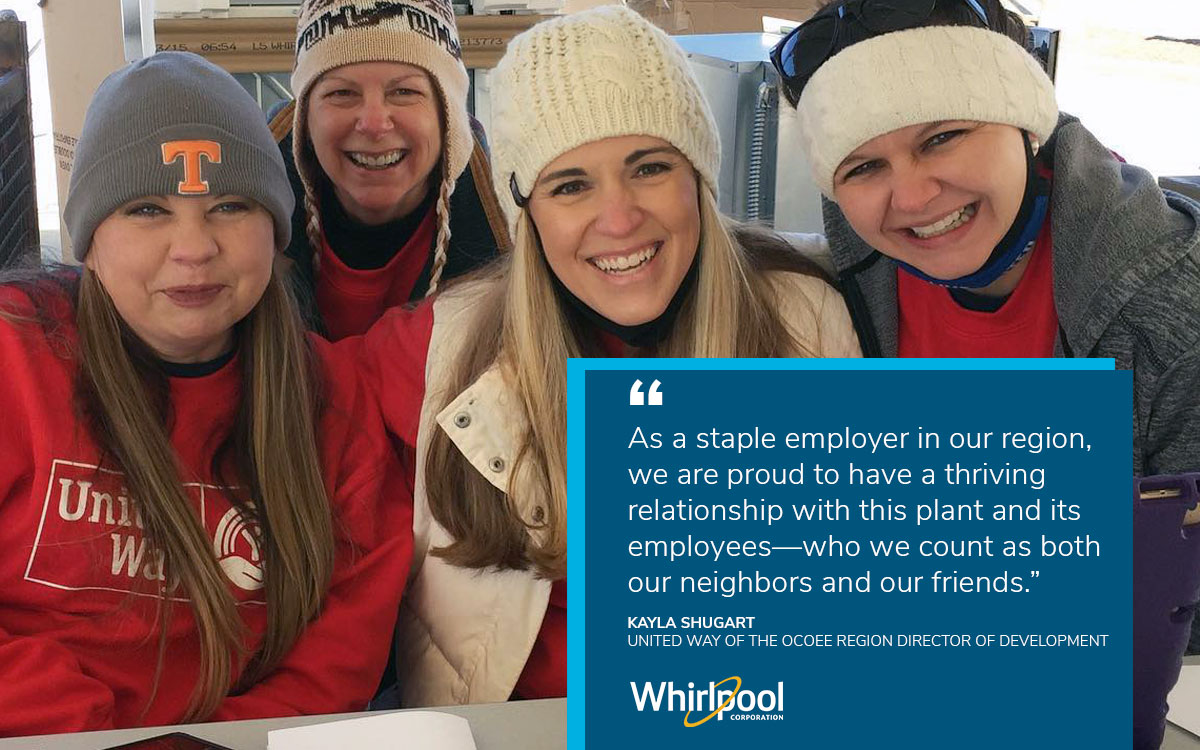 Smiling volunteers at the Whirlpool Corporation Cleveland, TN appliance sale benefiting United Way